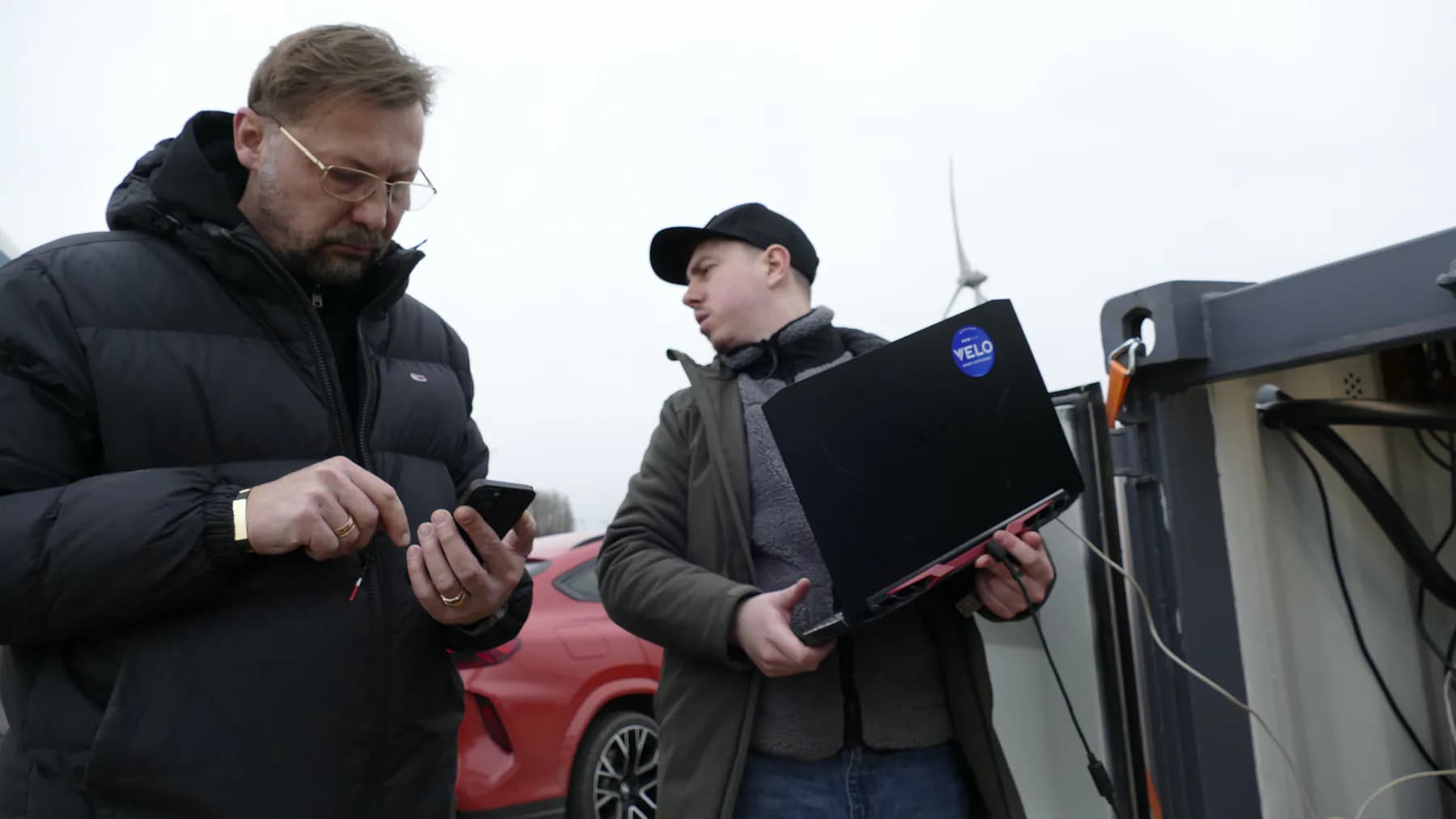 Engineers reviewing monitoring data during field commissioning