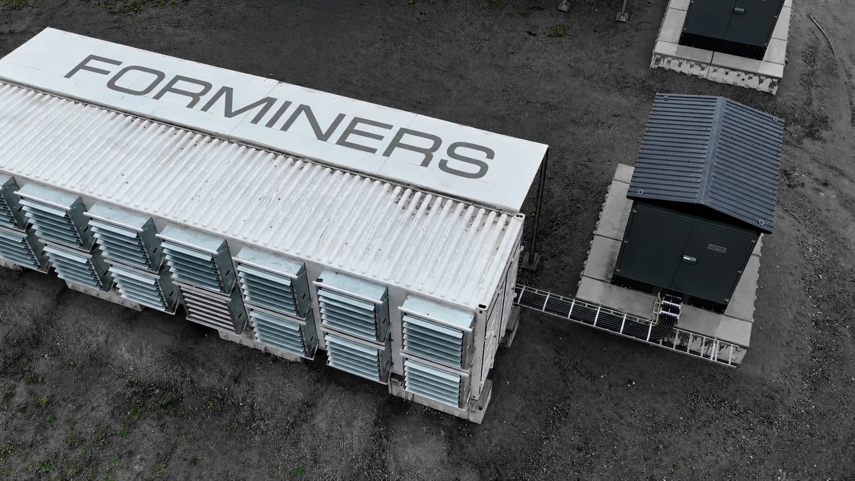 Aerial view of a ForMiners containerized ASIC installation and electrical connection