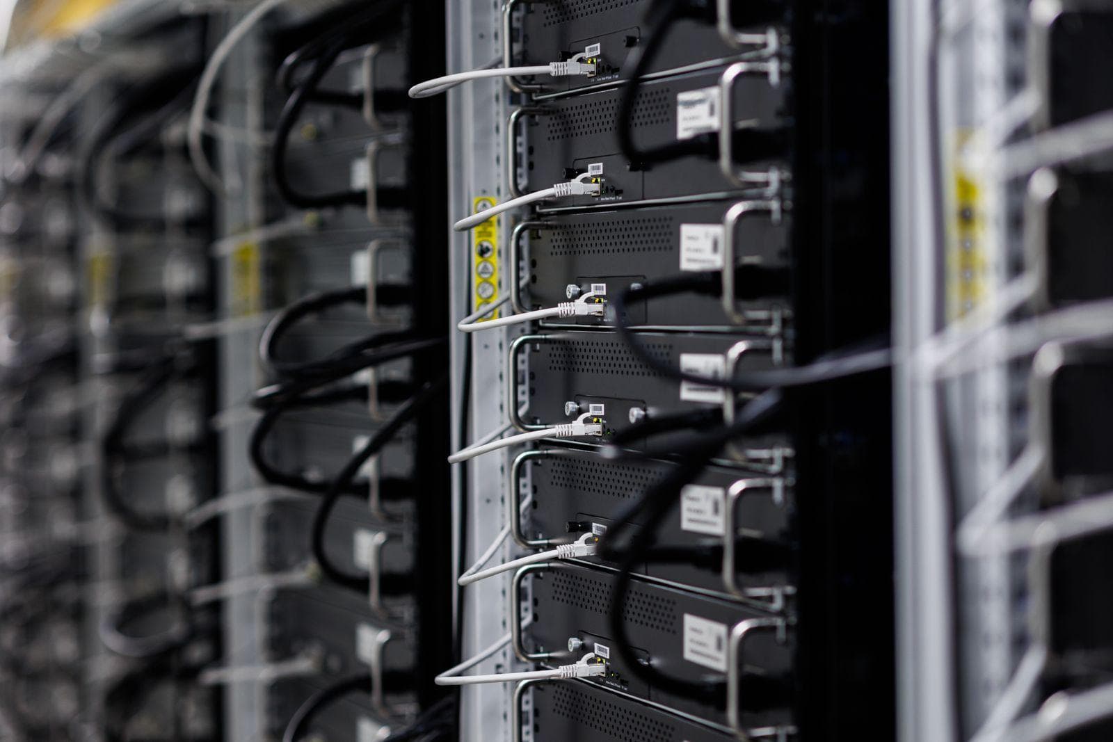 Network and power connections across a managed ASIC mining rack