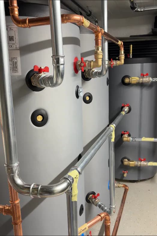 Thermal storage tanks and heating pipework