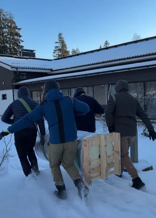Heating and mining equipment delivered to a building in winter